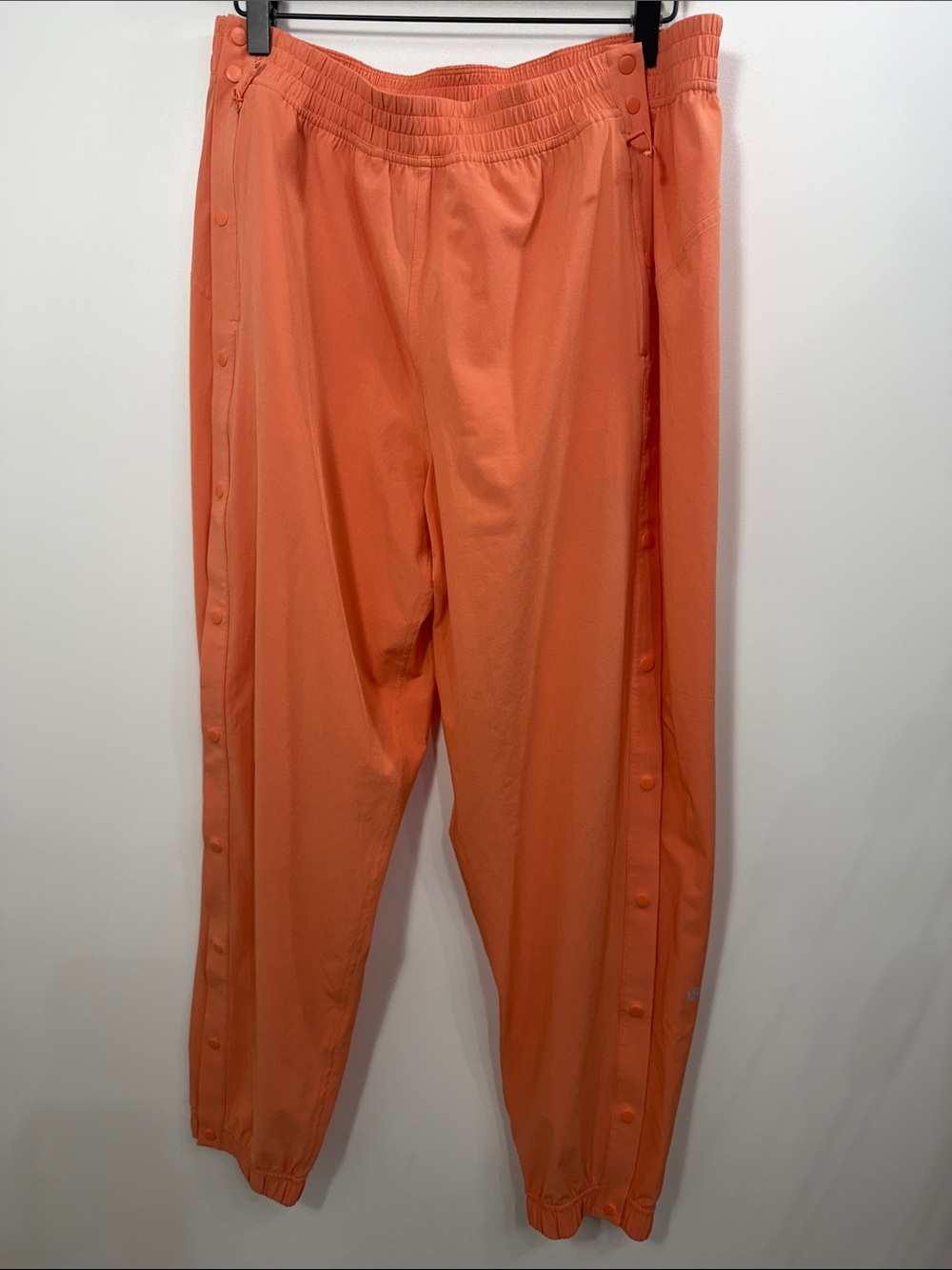 Lululemon women’s Tear Away mid rise track pants orange size 10